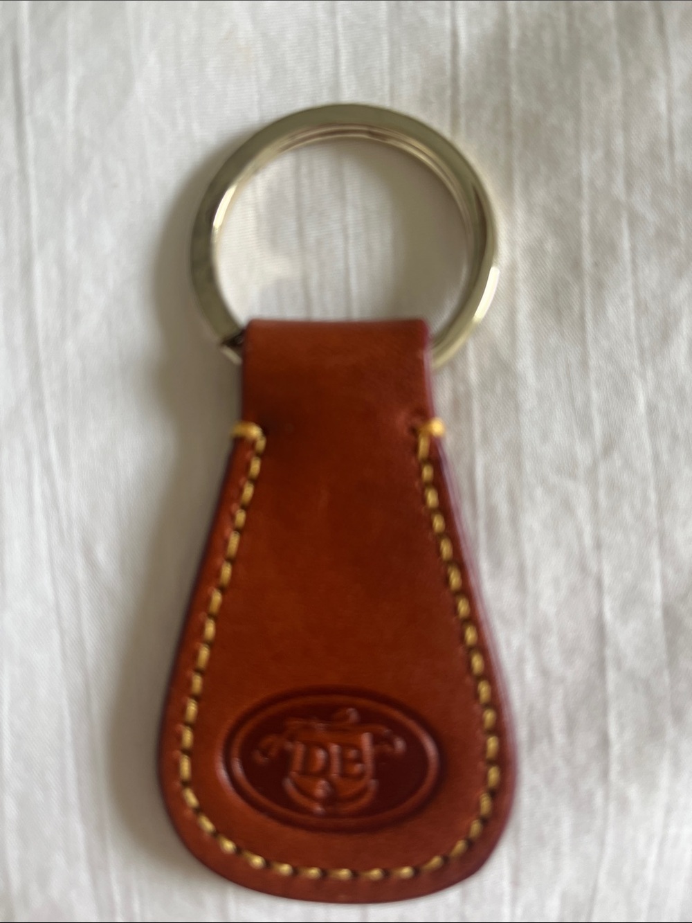 Dooney and Bourke Leather Key Fob in Brown with Embossed Initials